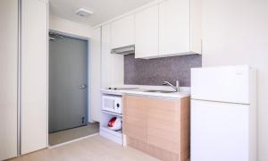 Kuchyň nebo kuchyňský kout v ubytování POL-A Resort Haeundae