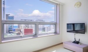 TV a/nebo společenská místnost v ubytování POL-A Resort Haeundae