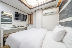 Cama o camas de una habitación en Kyoung Dong Hotel Myeongdong