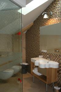 Koupelna v ubytování Hotel Orso Grigio
