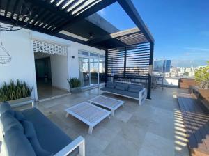 Un balcon sau o terasă la PiantiniTowerCentric SDQ CityView