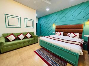 Ένα ή περισσότερα κρεβάτια σε δωμάτιο στο Hotel Amar