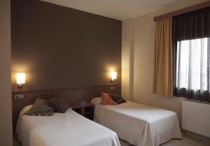 Krevet ili kreveti u jedinici u okviru objekta Hotel & Spa Can Josep