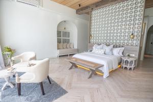 Postel nebo postele na pokoji v ubytování Malahini Kuda Bandos Resort