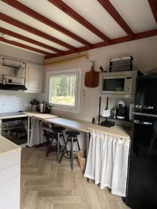 Η κουζίνα ή μικρή κουζίνα στο La Clairiere - Erezee- 3 bedroom chalet