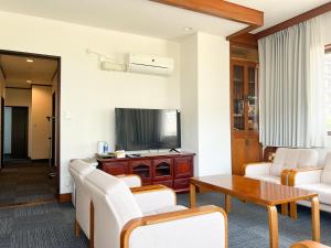 Een TV en/of entertainmentcenter bij Marina Bay Atami
