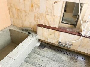 Een badkamer bij Marina Bay Atami