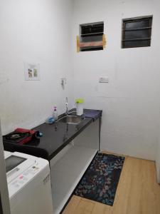 Kuchyň nebo kuchyňský kout v ubytování Sunny Point Hostel
