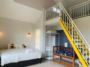 Postel nebo postele na pokoji v ubytování Na Na Doo Homestay + 37 fotografií