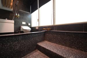 Η κουζίνα ή μικρή κουζίνα στο Tenlien onsen Hot Spring Hotel