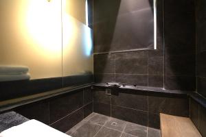 Ένα μπάνιο στο Tenlien onsen Hot Spring Hotel