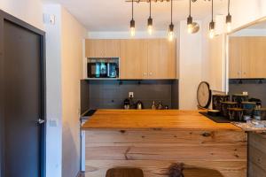 Kuchyň nebo kuchyňský kout v ubytování Courchevel au pied des pistes, La Tania