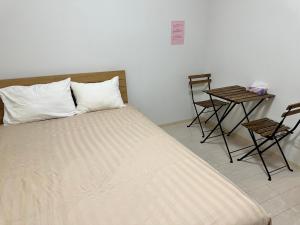 Voodi või voodid majutusasutuse Residence天王寺東 toas
