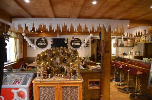 Salone o bar di Hotel Chalet Olympia