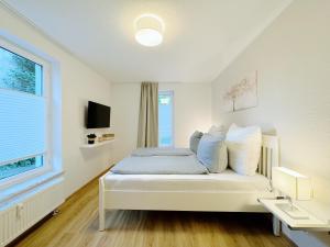 TV/trung tâm giải trí tại REGIOHOTEL Harzresidenz Wernigerode