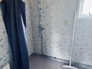 Koupelna v ubytování Piilijärvi Camping + 37 fotografií