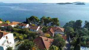 an aerial view of a village on a hill by the water at Holiday House Lido in Orebić