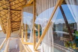 Μπαλκόνι ή βεράντα στο Villa Bamboo Lagoon - 3BR in Canggu
