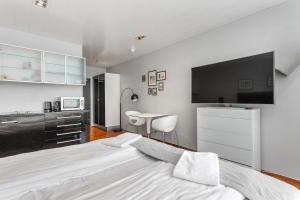 Η κουζίνα ή μικρή κουζίνα στο Midtown Hotel