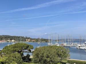 a view of a marina with boats in the water at L'Oustaou De Porquerolles in Porquerolles