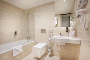 Koupelna v ubytování Grandior Hotel Prague