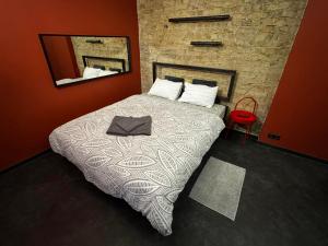 Postel nebo postele na pokoji v ubytování ApartHotel Riga