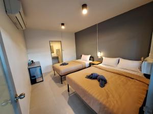 Postel nebo postele na pokoji v ubytování Slumberland at Pai