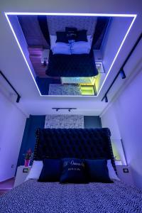 Postel nebo postele na pokoji v ubytování D'ossuna66 Suite & Spa