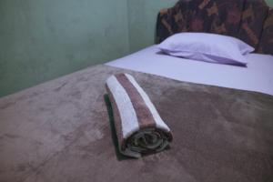 Raja Ampat Sandy Guesthouse客房内的一张或多张床位