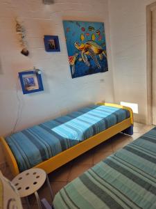 Postel nebo postele na pokoji v ubytování VILLA TRAMONTI SUL MARE