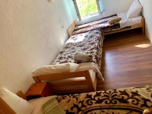 Postel nebo postele na pokoji v ubytování Sofia Guest House