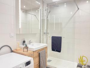 Koupelna v ubytování Duplex Élégant et Spacieux