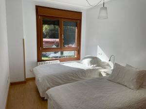Postel nebo postele na pokoji v ubytování La Cuenca, Edificio Los Molinos