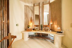 a bathroom with a sink and a mirror at Nangyuan Island Dive Resort in Ko Tao +37 photos