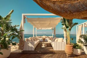 a living room with a view of the ocean at Radisson Blu Resort & Spa in Split