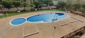 Bazén v ubytování Costa Caribe I World, Classic - ServHouse nebo v jeho okolí