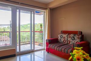 Posezení v ubytování Vijaya Deepa Guest House by LexStays