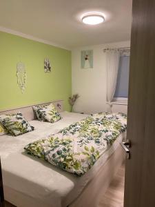 Postel nebo postele na pokoji v ubytování Apartmány Turkovna