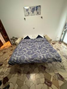 Postel nebo postele na pokoji v ubytování Cozy home baranzate