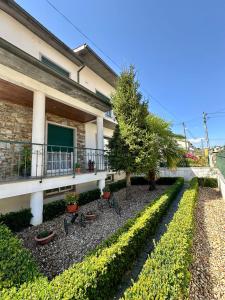 Κήπος έξω από το Quarto privado Eixo Atlântico