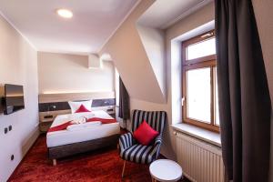 Postel nebo postele na pokoji v ubytování Hotel Lengenfelder Hof
