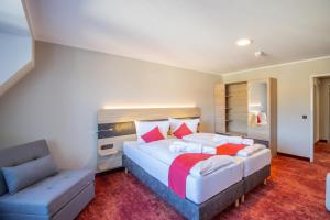 Postel nebo postele na pokoji v ubytování Hotel Lengenfelder Hof