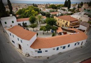 an overhead view of a house with an orange roof at The Courtyard Episkopi Guest Houses in Episkopi Limassol
