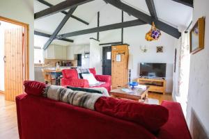 Televiisor ja/või meelelahutuskeskus majutusasutuses Bligh - Treworgie Barton Cottages