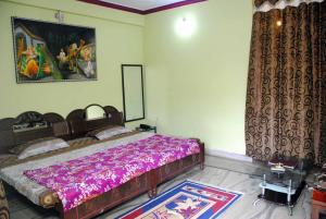 A bed or beds in a room at Hill View