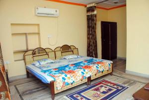 A bed or beds in a room at Hill View