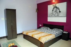 A bed or beds in a room at Hill View