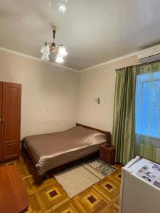 Postel nebo postele na pokoji v ubytování Затишні номери в самому центрі Одеси