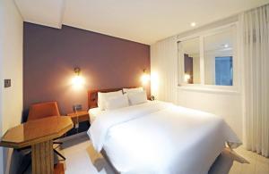 Seosan Hound Hotel客房内的一张或多张床位