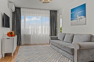 Et tv og/eller underholdning på Apartament de lux Moghioros Park